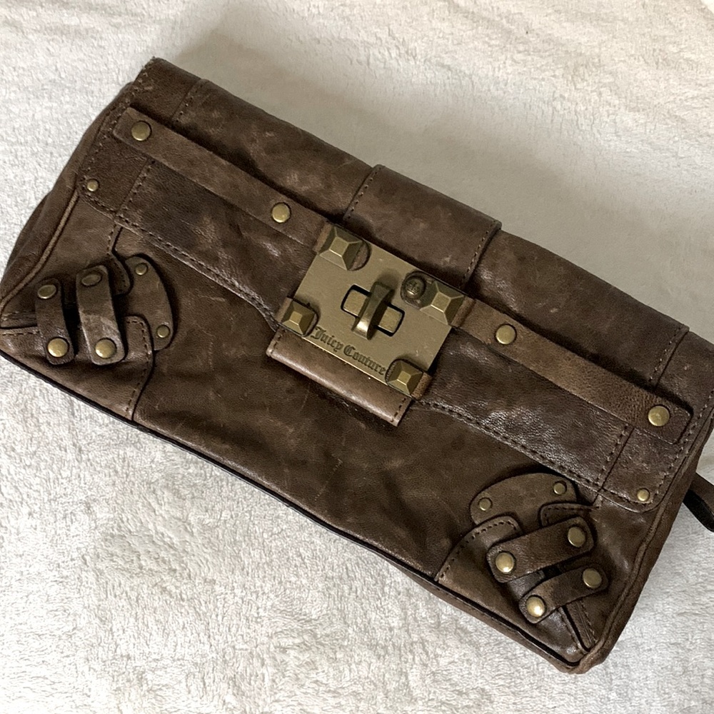 Vintage Juicy Couture with heavy hardware twist lock in excellent condition